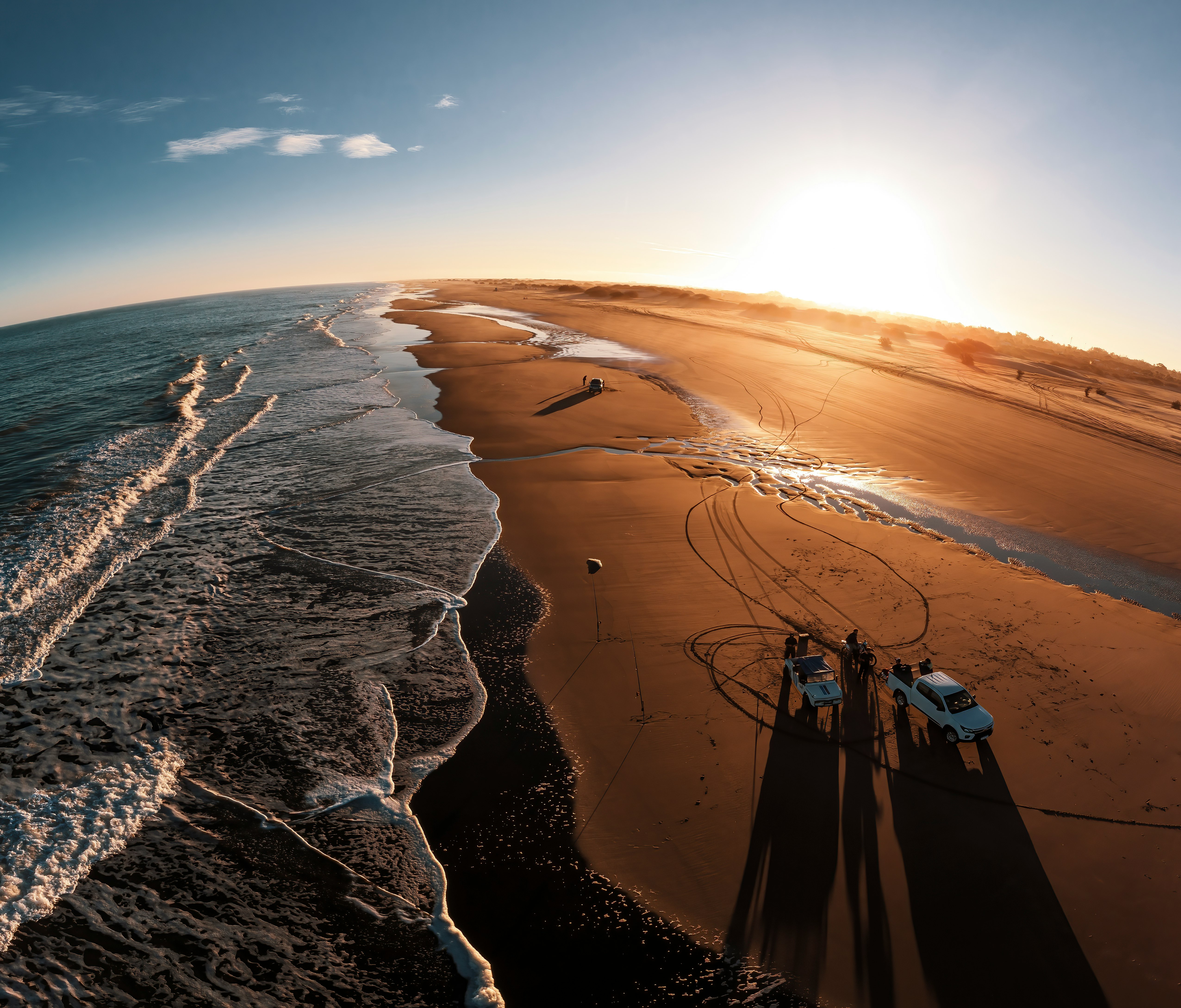 people walking on beach during daytime